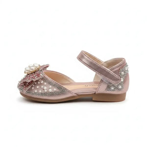 Princess pearl bow baby shoe in pink with ankle strap and decorative pearls