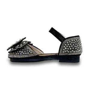 Black baby shoes with pearl and rhinestone embellishments, featuring a decorative bow and ankle strap