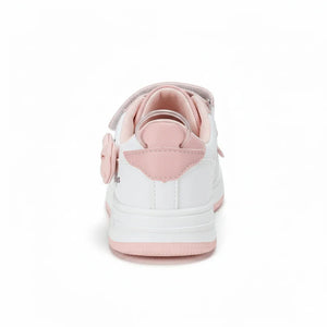 Back view of white baby sneaker with pink sole, heel tab, and flower detail on white background
