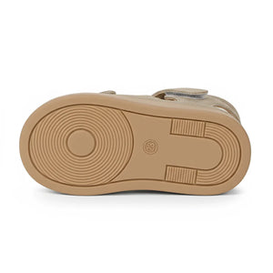 Beige baby sandal sole with circular tread pattern and size 23 marking