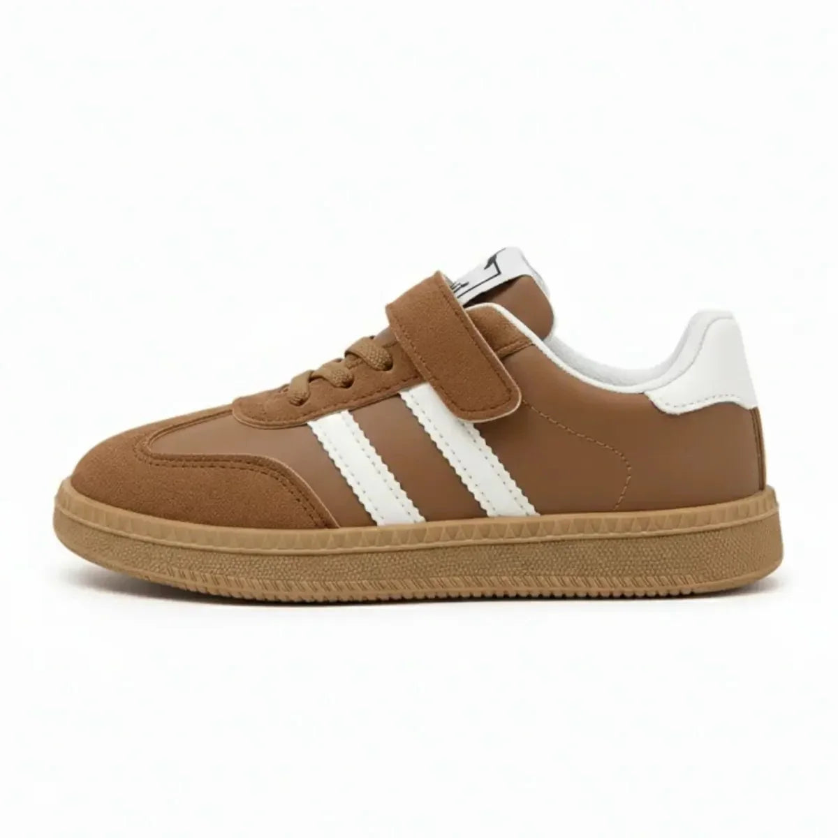 Classic brown kids sneakers with white stripes and velcro strap on white background