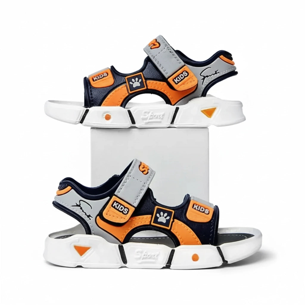 Kids sporty sandals in navy blue, orange, and gray with white soles and velcro straps