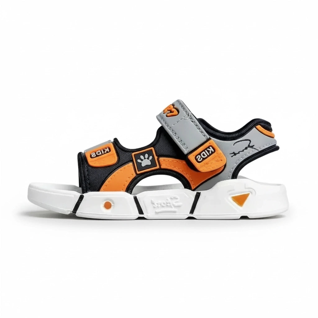 Kids sandal in black, orange, and gray with Velcro straps and white sole, featuring paw print design
