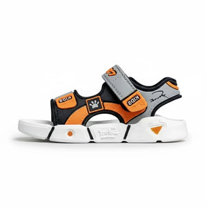 Kids sandal in black, orange, and gray with Velcro straps and white sole, featuring paw print design