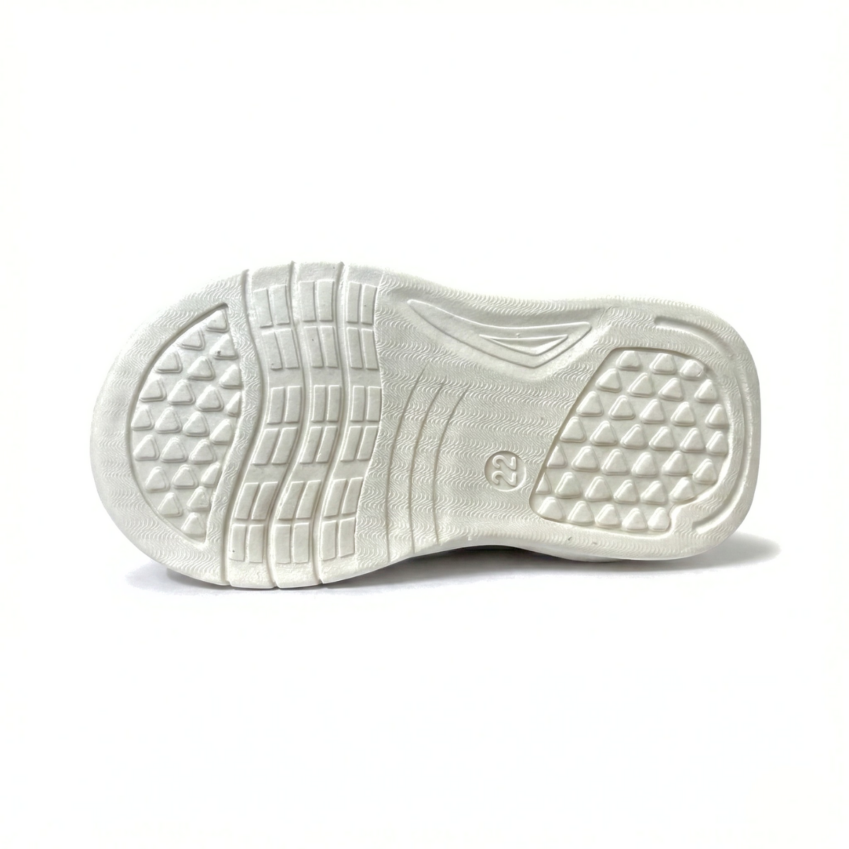 White shoe sole with textured pattern on a white background