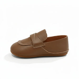 Classic brown leather baby loafer shoe with stitched detailing on white background